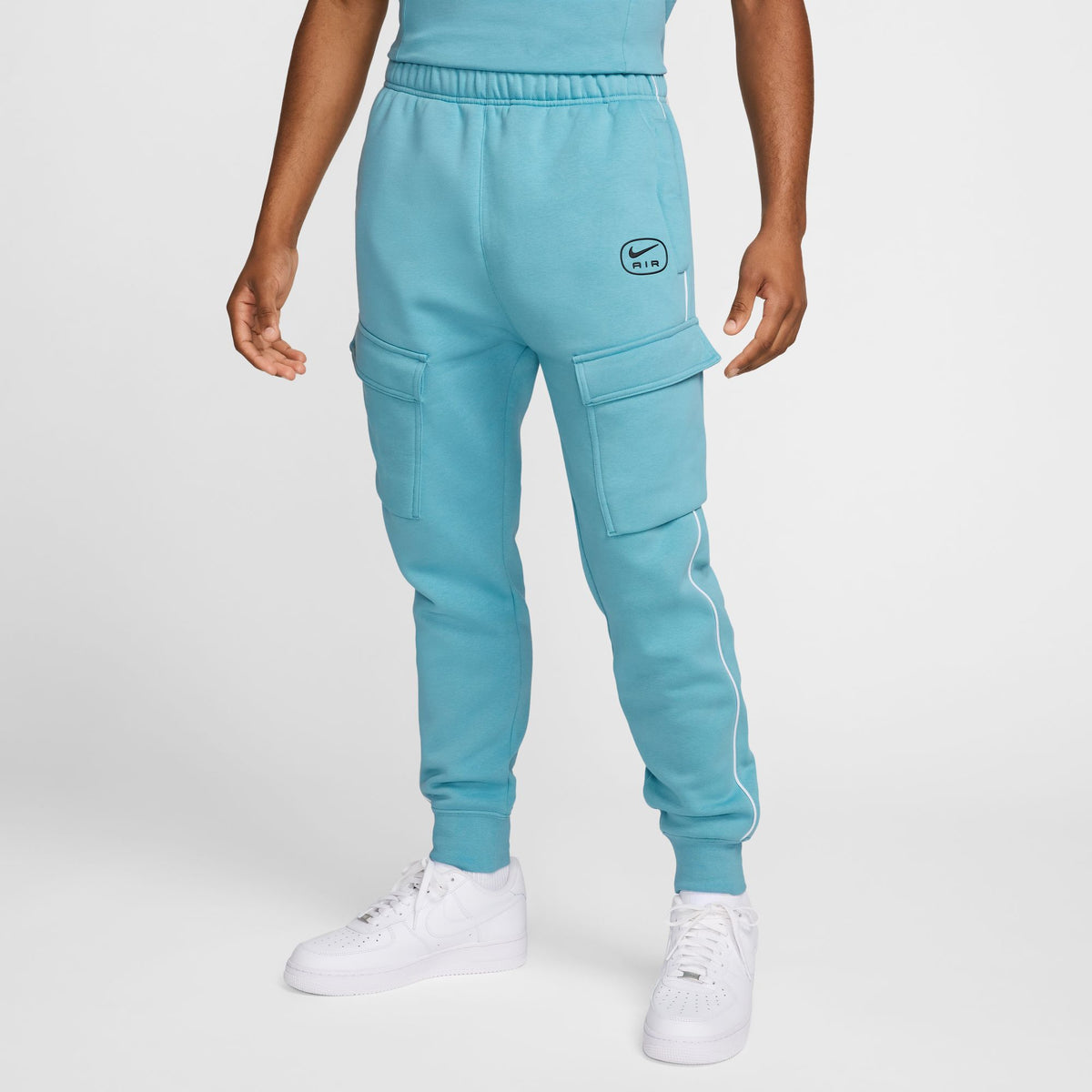 M NSW SW AIR CARGO PANT FLC BB DENIM TURQ/BLACK Bild 1